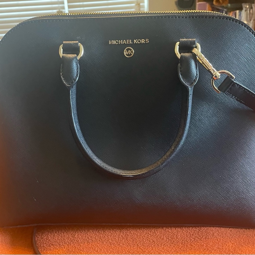 Black Michael Kors handbag/shoulder strap, good condition, no tears or stains.